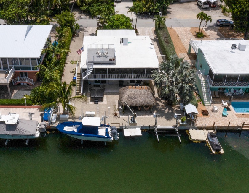 Welcome to Ocean Drive! This exquisite waterfront property is in - Beach Home for sale in Plantation Key, Florida on Beachhouse.com