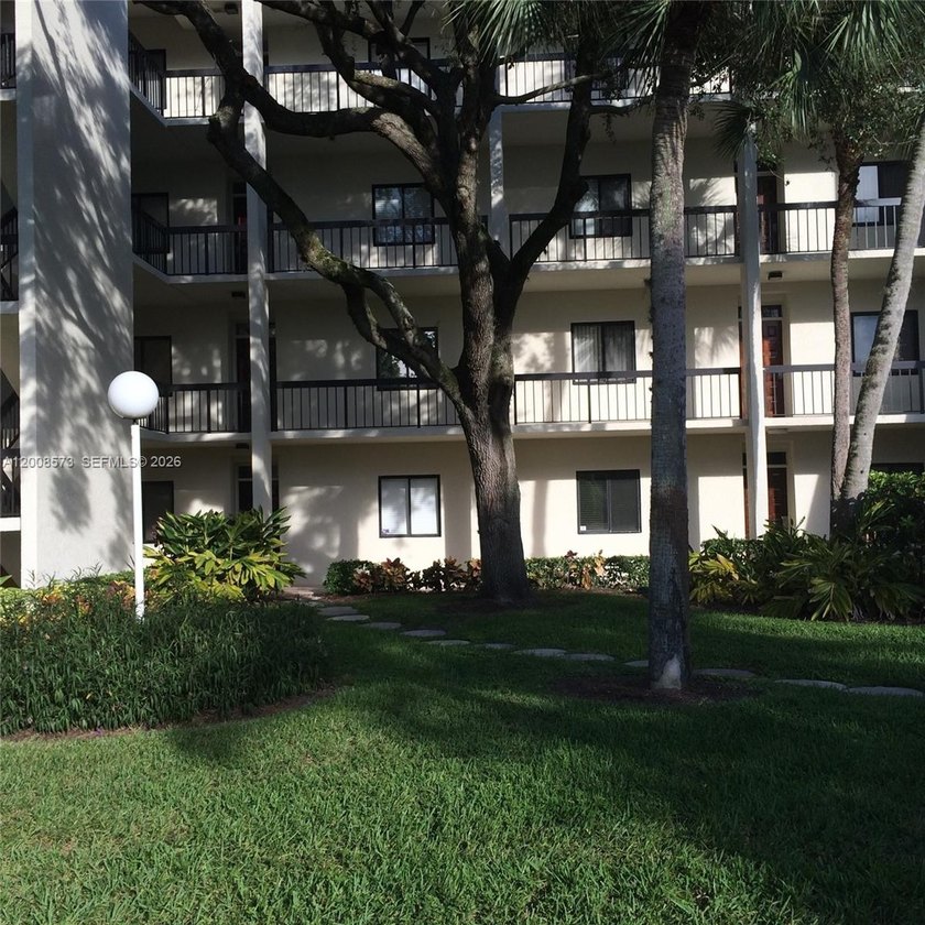 First-floor condo located in a gated golf community with a 24H - Beach Condo for sale in West Palm Beach, Florida on Beachhouse.com