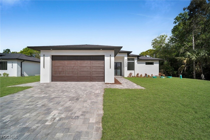 Brand-new construction offering 1,507 sq ft under air with a - Beach Home for sale in Lehigh Acres, Florida on Beachhouse.com