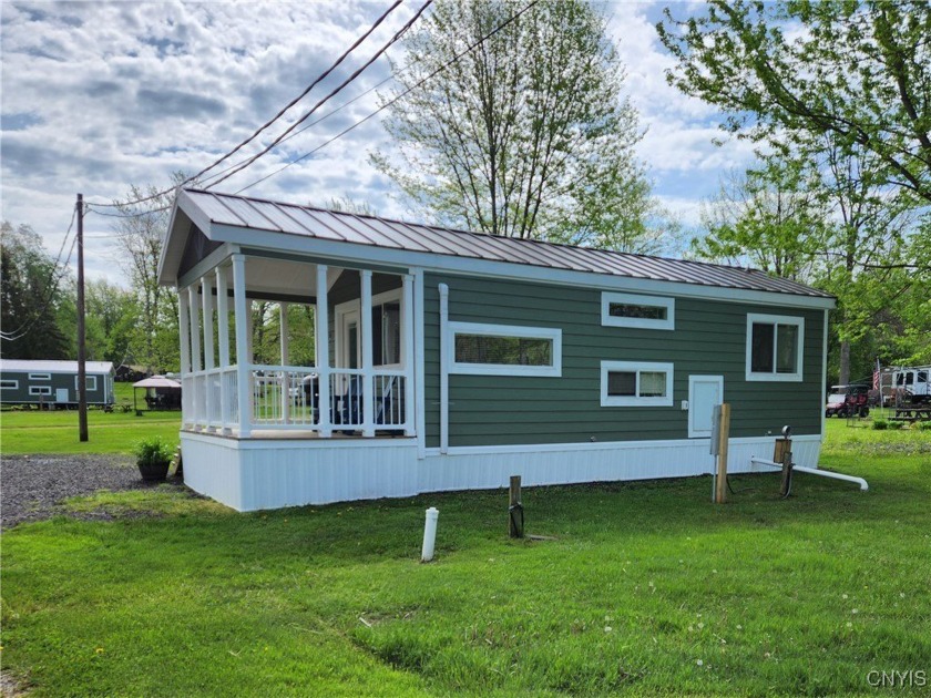Discover your perfect summer escape with this beautifully - Beach Home for sale in Huron, New York on Beachhouse.com