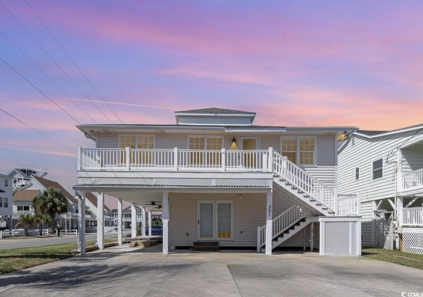 Nestled in the picturesque Cherry Grove Beach, this exquisite - Beach Home for sale in North Myrtle Beach, South Carolina on Beachhouse.com