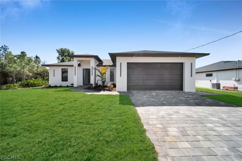 Brand-new construction offering 1,387 sq ft under air with a - Beach Home for sale in Lehigh Acres, Florida on Beachhouse.com