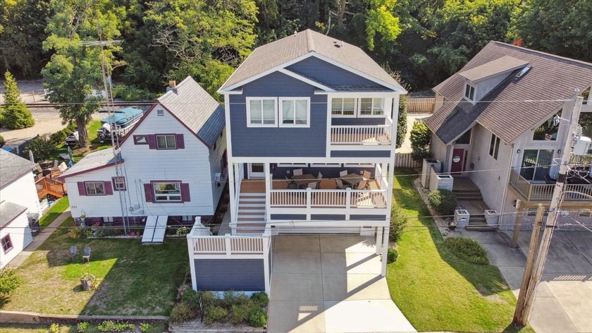 Beachside Bliss in the Heart of St. Joseph Just steps from - Beach Home for sale in Saint Joseph, Michigan on Beachhouse.com