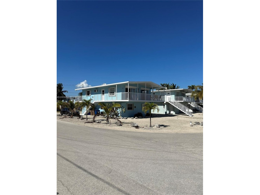 An amazing 5 bedroom 2 Bath solid concrete home, including the - Beach Home for sale in Key Largo, Florida on Beachhouse.com