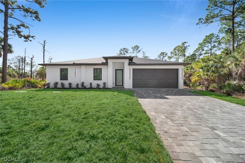 Brand-new construction offering 1,270 sq ft under air with a - Beach Home for sale in Lehigh Acres, Florida on Beachhouse.com