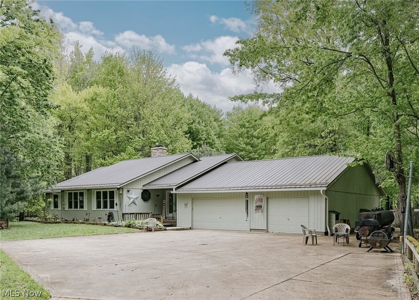 Welcome to 7814 Poorman Rd in Vermilion, an expansive ranch set - Beach Home for sale in Vermilion, Ohio on Beachhouse.com