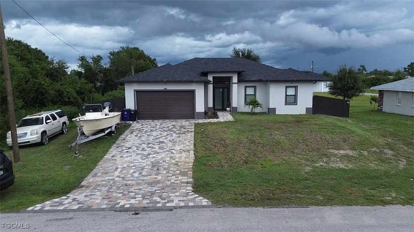 Step into this Stunning new construction in the heart of Lehigh - Beach Home for sale in Lehigh Acres, Florida on Beachhouse.com