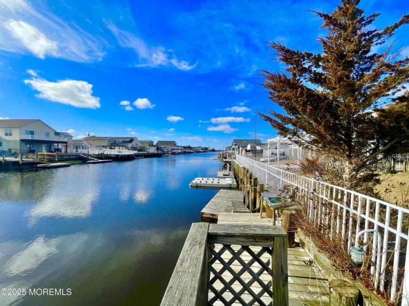 Rise to tranquil waterside vistas in this stunning  home - Beach Home for sale in Little Egg Harbor, New Jersey on Beachhouse.com
