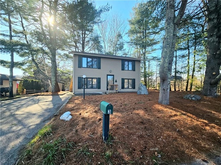 Fabulous opportunity to own this 3-bedroom, 1.5-bath split-level - Beach Home for sale in Narragansett, Rhode Island on Beachhouse.com