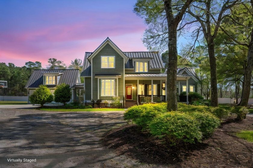 Tucked away at the end of a gravel Road, this custom home sits - Beach Home for sale in Little River, South Carolina on Beachhouse.com