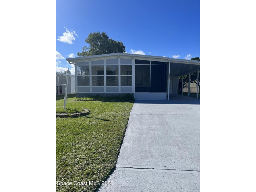 Recently remodeled.  Great vacation home or permanent residence - Beach Home for sale in Barefoot Bay, Florida on Beachhouse.com