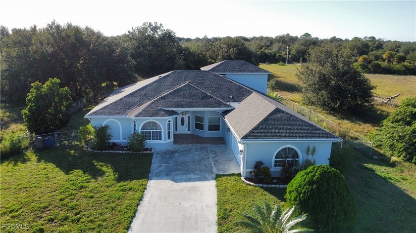 A True Hidden Gem in Lehigh Acres! Welcome to this stunning - Beach Home for sale in Lehigh Acres, Florida on Beachhouse.com