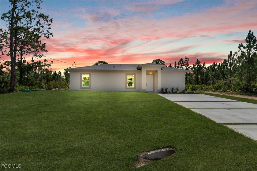 NEW CONSTRUCTION! 3-bedroom, 2-bath home featuring elegant - Beach Home for sale in Lehigh Acres, Florida on Beachhouse.com