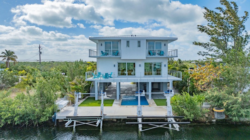 Immerse yourself in Keys living at its finest in this modern - Beach Home for sale in Big Pine Key, Florida on Beachhouse.com
