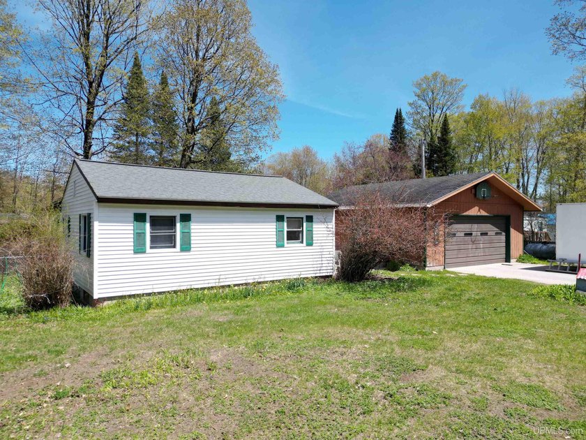 This cute and cozy 2 bedroom home sits on a quiet residential - Beach Home for sale in Manistique, Michigan on Beachhouse.com