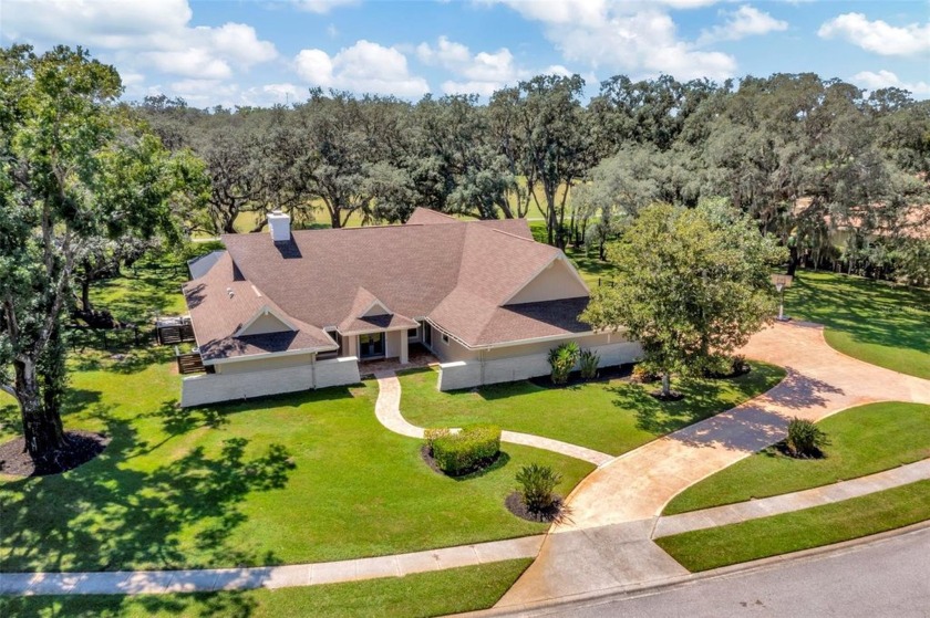 Welcome to 1001 Royal Birkdale Dr, a luxurious 4-bedroom - Beach Home for sale in Tarpon Springs, Florida on Beachhouse.com