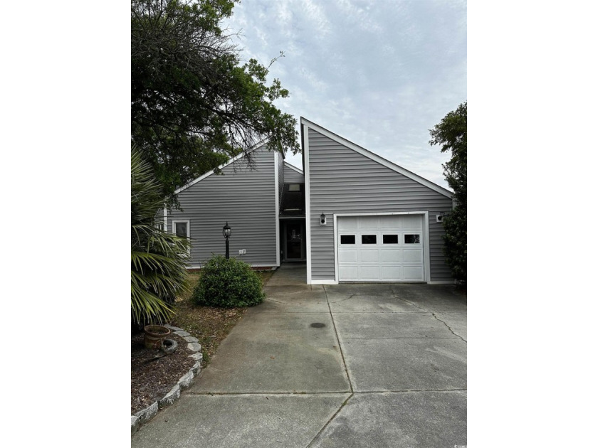 This lovely 3BR/2BA Patio home with NO HOA is located in the - Beach Home for sale in North Myrtle Beach, South Carolina on Beachhouse.com