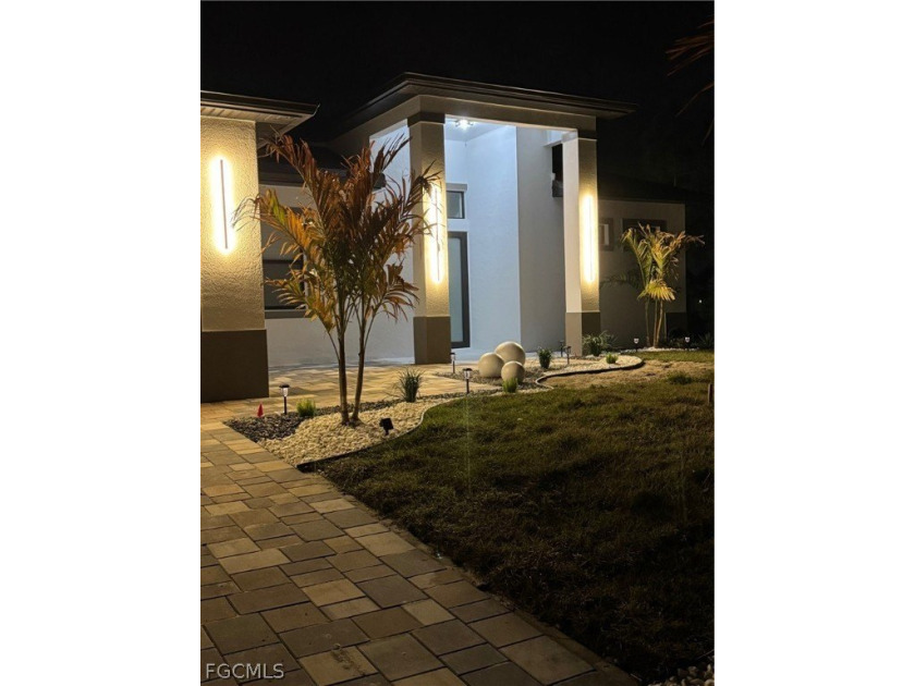 Stunning brand-new modern residence offering 3 bedrooms, 2 - Beach Home for sale in Lehigh Acres, Florida on Beachhouse.com