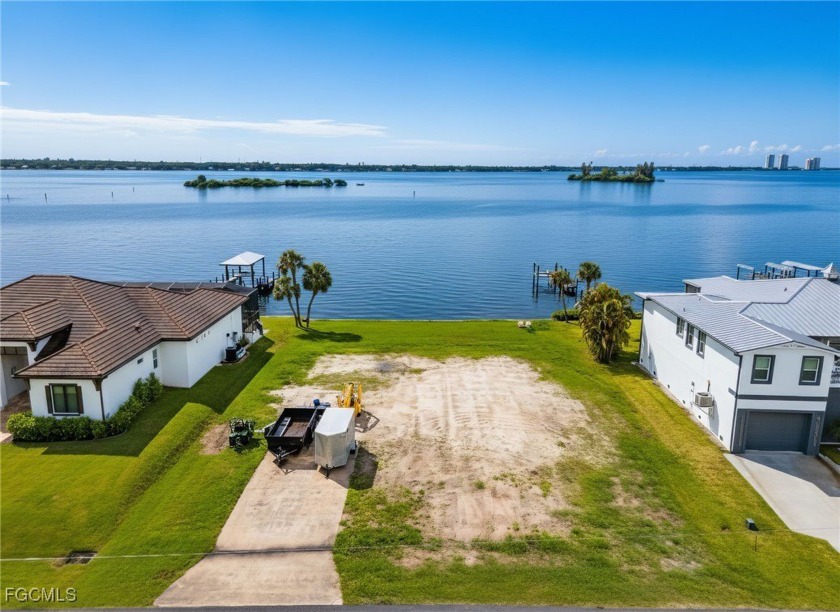 Build-to-suit! A Front-Row Seat to Stunning River Views! Rare - Beach Lot for sale in North Fort Myers, Florida on Beachhouse.com