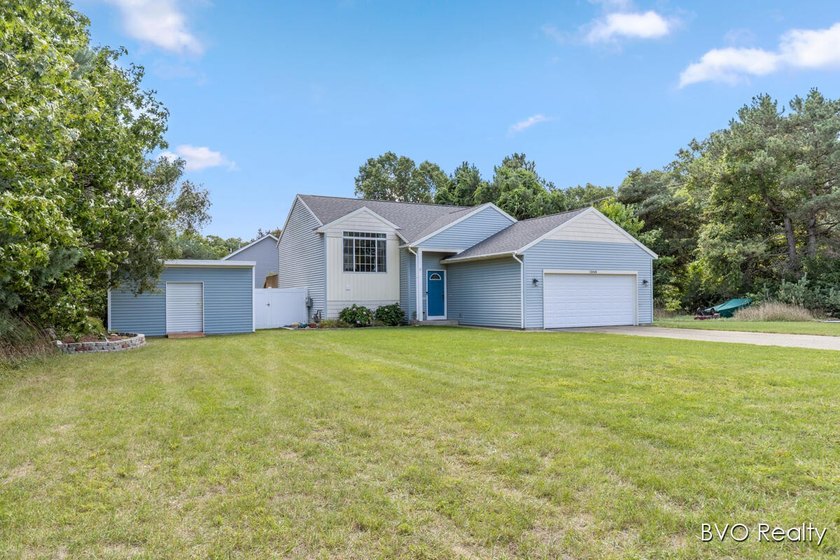 Welcome to 15448 Meadowlark Dr, a move-in ready home offering - Beach Home for sale in Grand Haven, Michigan on Beachhouse.com