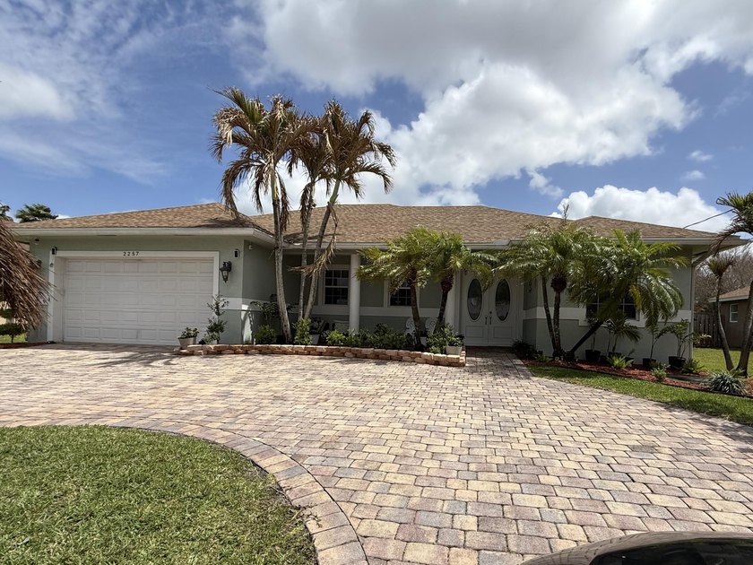 Welcome home to this immaculately maintained canal front home - Beach Home for sale in Port Saint Lucie, Florida on Beachhouse.com