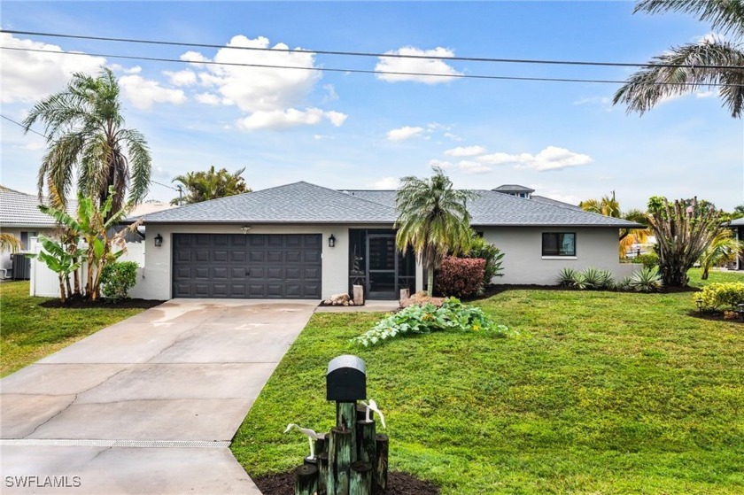 Newly Updated Three-Bedroom, Two-Bath Waterfront Pool Home in - Beach Home for sale in Cape Coral, Florida on Beachhouse.com