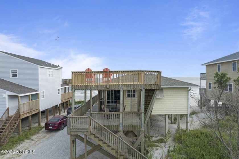 Step into this captivating beach duplex, where comfort and - Beach Townhome/Townhouse for sale in North Topsail Beach, North Carolina on Beachhouse.com