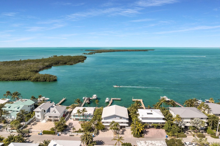 This waterfront paradise has everything you could desire! Enjoy - Beach Home for sale in Plantation Key, Florida on Beachhouse.com