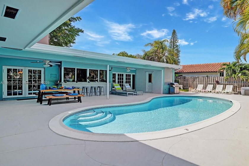 Step into this stunning 4-bedroom, 3-Bath home on a 9,500sqft - Beach Home for sale in Hollywood, Florida on Beachhouse.com