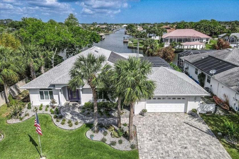 Beautiful saltwater canal home in Palm Harbor with direct canal - Beach Home for sale in Palm Coast, Florida on Beachhouse.com