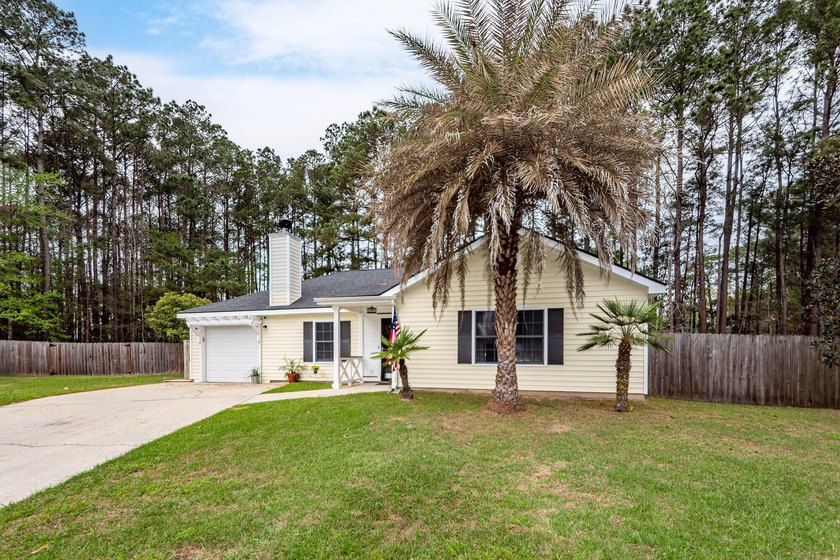 Charming one-story home nestled on a quiet cul-de-sac with an - Beach Home for sale in Hanahan, South Carolina on Beachhouse.com
