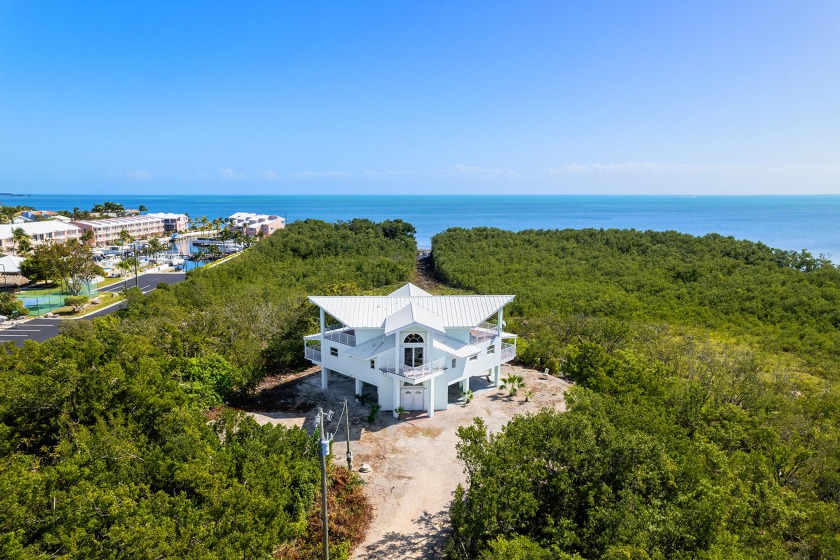 Escape to paradise with this exceptional oceanfront home located - Beach Home for sale in Key Largo, Florida on Beachhouse.com