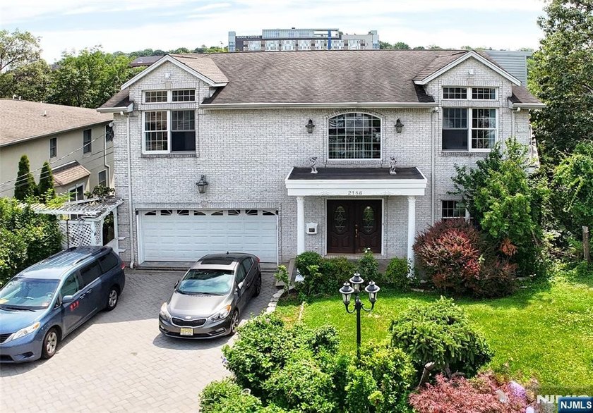 Welcome to this stunning and oversized center hall colonial - Beach Home for sale in Fort Lee, New Jersey on Beachhouse.com