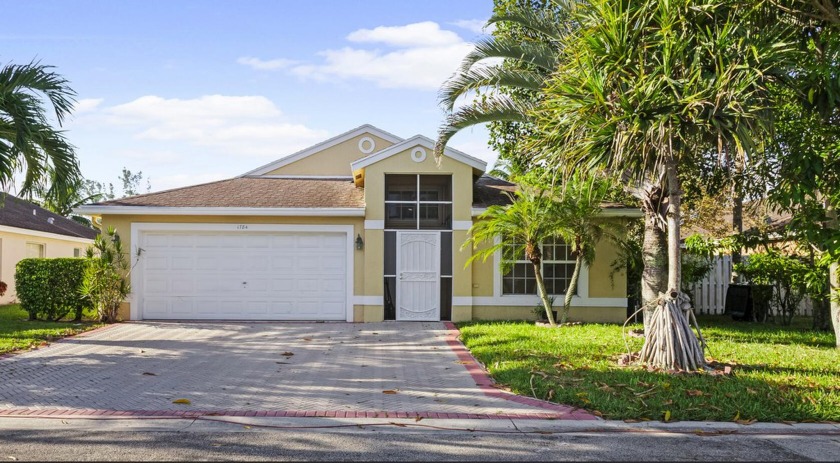 Experience the stunning water view from this spacious 3-bedroom - Beach Home for sale in Greenacres, Florida on Beachhouse.com