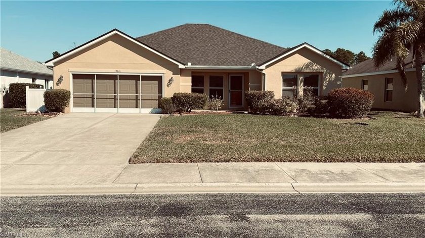 You will love this home in Town Lakes, a Gated Community with - Beach Home for sale in Lehigh Acres, Florida on Beachhouse.com