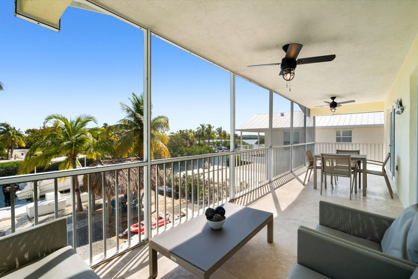 WATERFRONT TROPICAL RETREAT! Exceptional home with all the - Beach Home for sale in Key Largo, Florida on Beachhouse.com