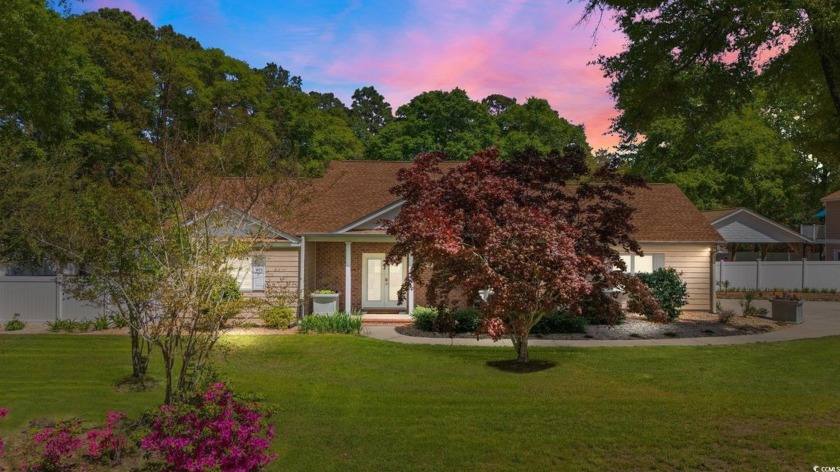 This extraordinary 1.25-acre property in Pawleys Island offers - Beach Home for sale in Pawleys Island, South Carolina on Beachhouse.com
