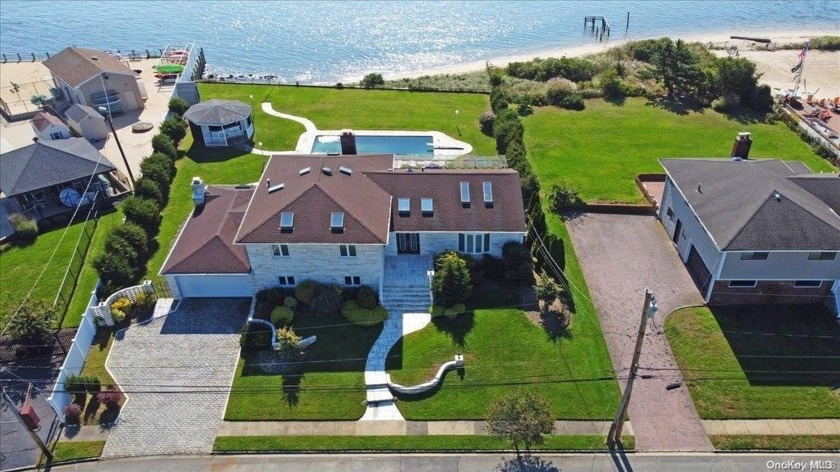 Exquisite & Contemporary Waterfront Split Level Home Set On - Beach Home for sale in Oyster Bay, New York on Beachhouse.com