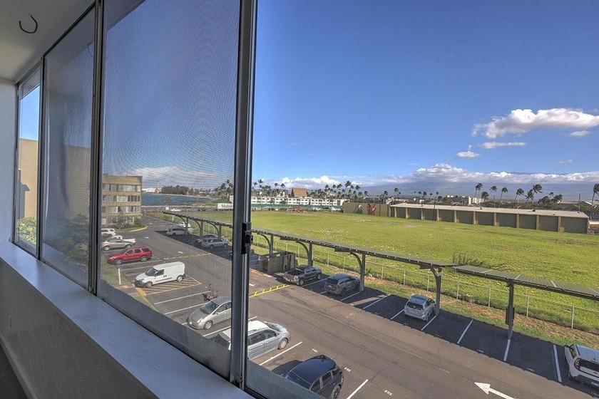 Ocean view Harbor Lights without all the traffic noise. Unit - Beach Condo for sale in Kahului, Hawaii on Beachhouse.com