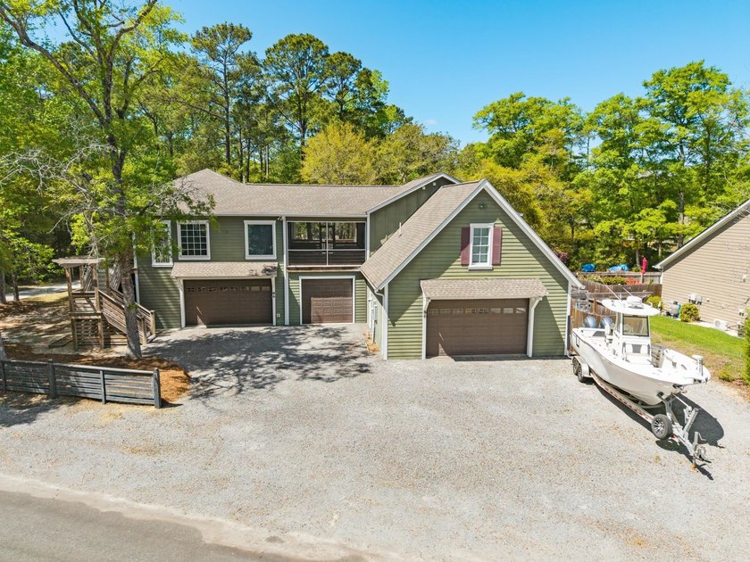 Nestled in the heart of Pawleys Island, this beautifully - Beach Home for sale in Pawleys Island, South Carolina on Beachhouse.com
