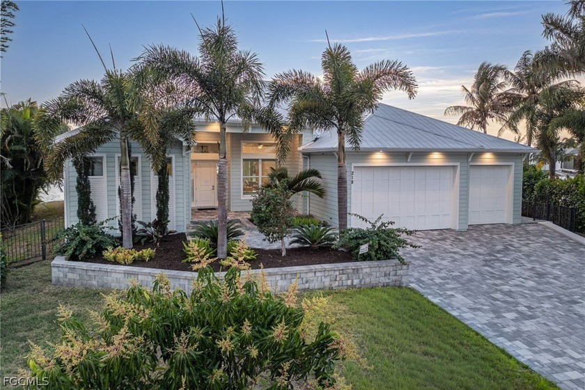 Located at 218 Bayshore Dr, this custom-built luxury residence - Beach Home for sale in Cape Coral, Florida on Beachhouse.com
