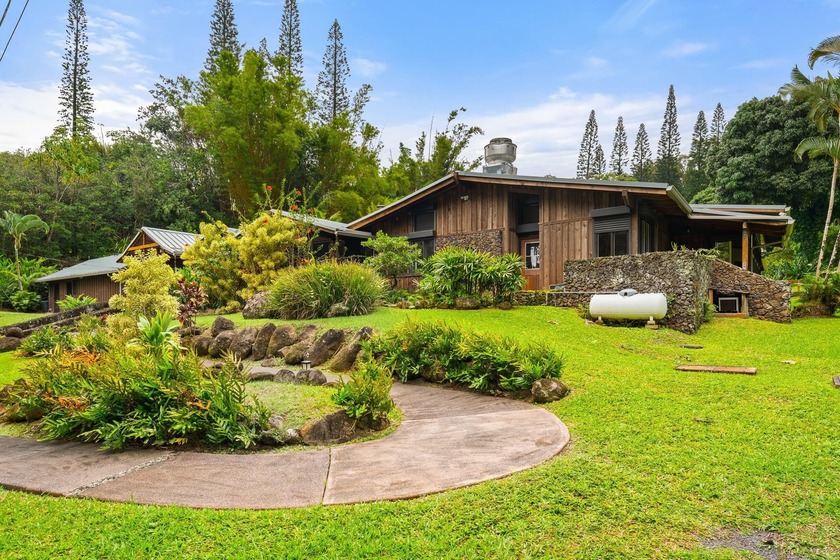 Set across sixteen acres of fully fenced acreage, this Haiku - Beach Home for sale in Haiku, Hawaii on Beachhouse.com