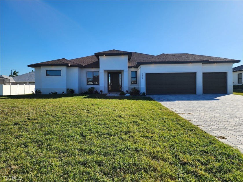 RARE TRIPLE-LOT LUXURY | COMPLETION MARCH 2026! Skip the long - Beach Home for sale in Cape Coral, Florida on Beachhouse.com