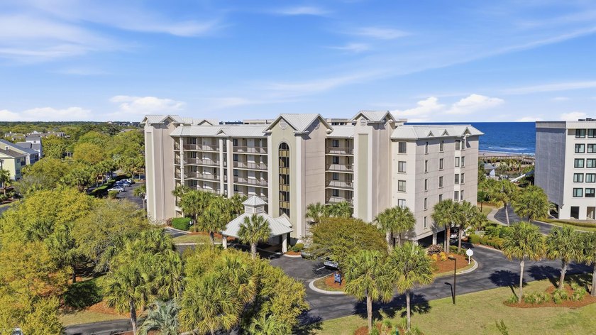 Experience the ultimate oceanfront location in this fully - Beach Condo for sale in Pawleys Island, South Carolina on Beachhouse.com