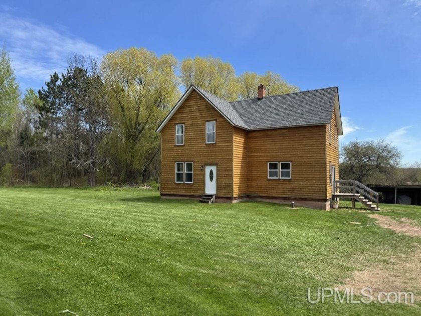 Very well-maintained 2-story farmhouse situated on just under 2 - Beach Home for sale in Baraga, Michigan on Beachhouse.com