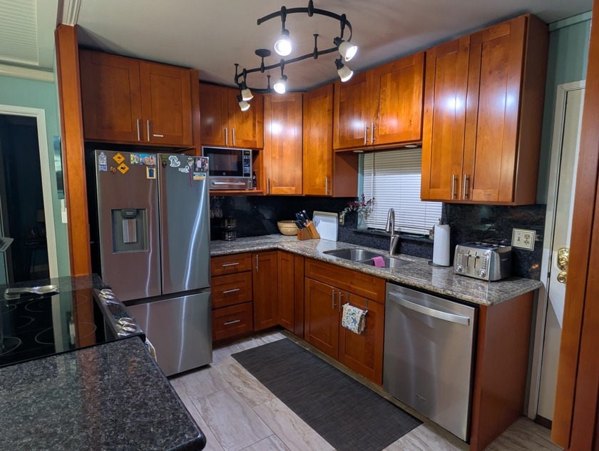 RARE upgraded 3-bedroom, 3-bath condominium featuring two - Beach Condo for sale in Kihei, Hawaii on Beachhouse.com