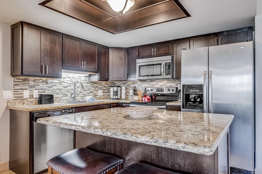 Hotel Zoned Maui Banyan G-210 is an upgraded, turn-key 2-bedroom - Beach Condo for sale in Kihei, Hawaii on Beachhouse.com