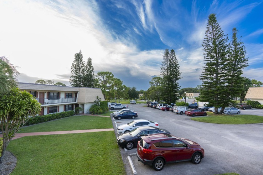 Discover the tranquility of this 2nd floor corner unit in a - Beach Condo for sale in Greenacres, Florida on Beachhouse.com