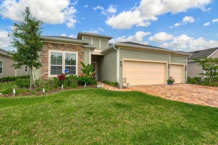 Welcome to this immaculate Amelia Walk home, where charm meets - Beach Home for sale in Fernandina Beach, Florida on Beachhouse.com