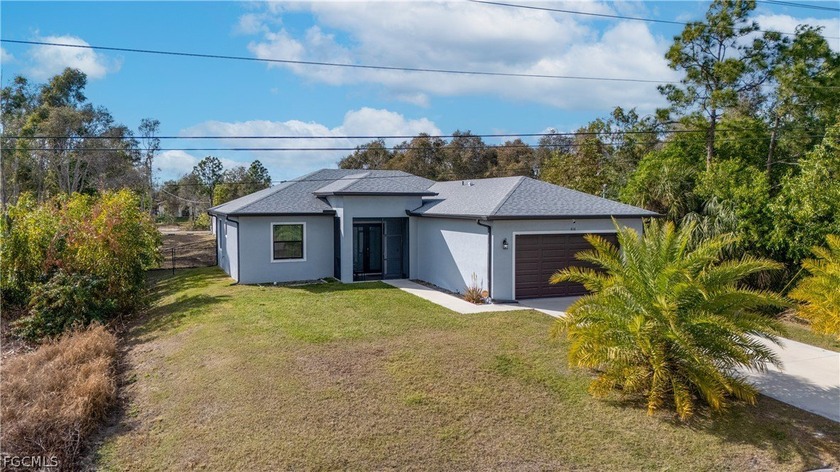 NO HOA - NO FLOOD INSURANCE REQUIRED - STORM PROTECTION - FENCED - Beach Home for sale in Lehigh Acres, Florida on Beachhouse.com